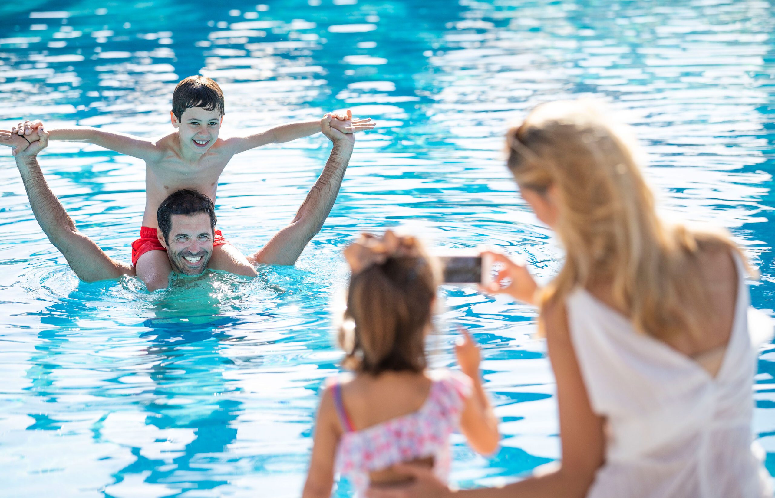 Family at the pool PortBlue Club Pollentia Resort & Spa